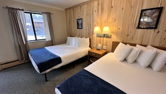 1 King Bed + 1 Queen Bed Lodge Room